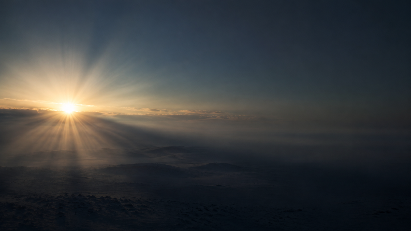 Light emerging over the horizon